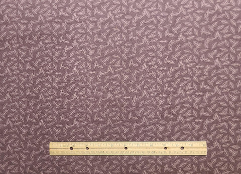 JoAnn Fabrics - Puce Flannel Fabric / Cream Tossed Leaf Silhouette Print