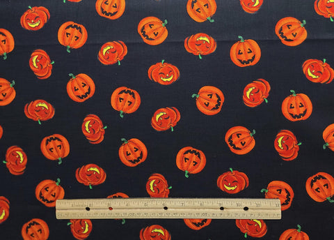 Black Fabric / Tossed Jack-O-Lantern and Pumpkin Print - Selvage to Selvage Print