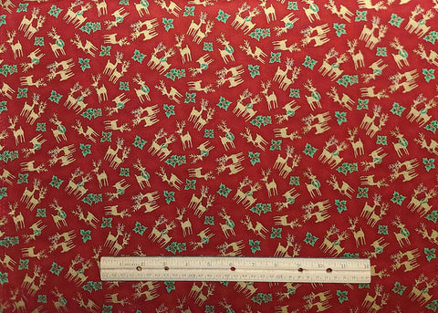 Season's Greetings by Fabric-Quilt Inc 720 - Dark Red Fabric / Gold Metallic Reindeer, Green Holly Leaf Print
