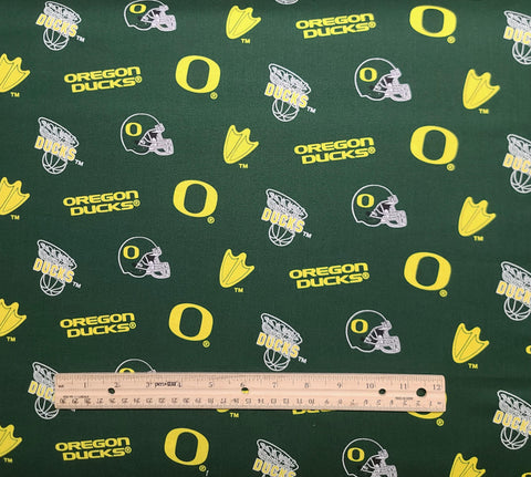 Sykel Enterprises Fabrique Innovations OR045 - University of Oregon Logo Fabric / Green, Yellow, White Tossed Logos