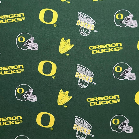 Sykel Enterprises Fabrique Innovations OR045 - University of Oregon Logo Fabric / Green, Yellow, White Tossed Logos