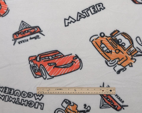 CP75282 Classic Cars Disney/Pixar Springs Creative 2022 - 59" WIDE White Fleece Fabric / Tossed Lightning McQueen, Mater, Cars Logo