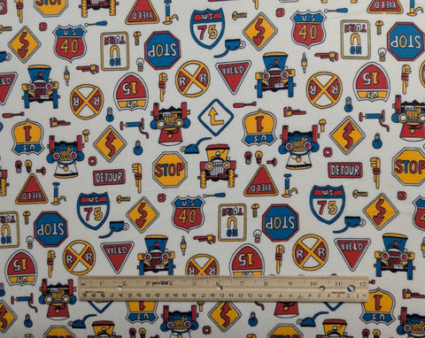 White Flannel Fabric / Red, Yellow, Blue Traffic Signs, Tractors - Selvage to Selvage Print