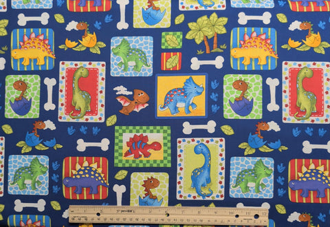Blank Quilting 6780 2013 - Navy Fabric / Red, Green, Yellow Cartoon Baby Dino Block Print