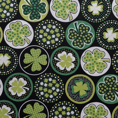 JoAnn Fabrics - Black Fabric / White, Green Packed Shamrock Badges Print