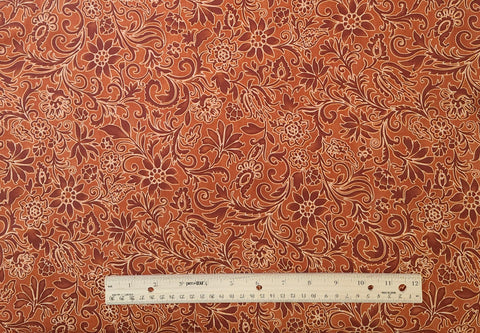 South Pacific 2468-22 South Pacific Illusion Terracotta Benartex - Burnt Orange Fabric / Dark Burnt Orange, White Packed Flower Print