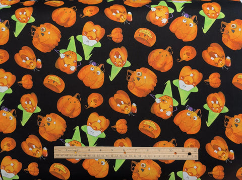 Pungkin Peers Julia Debson Minor Artworks! Studio E - Black Fabric / Tossed Cartoon-Style Jack-O-Lantern Print