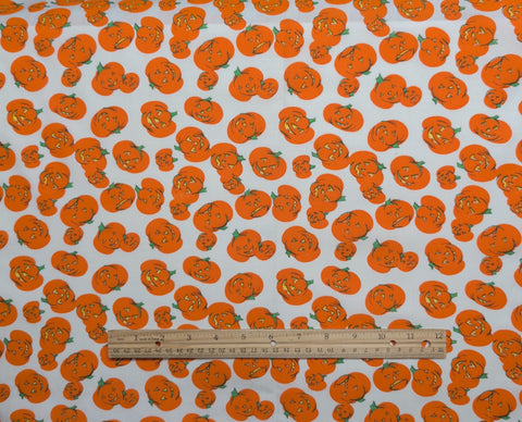 Vintage White Fabric / Tossed Jack-O-Lantern Print - Selvage to Selvage Print