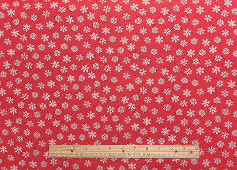 Red Fabric / White and Green Snowflake Print - Selvage to Selvage Print