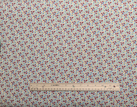 Aunt Grace Sweeties by Judie Rothermel for Marcus Brothers Textiles - White Fabric / Red, Yellow, Blue Packed Flower, Vine Print