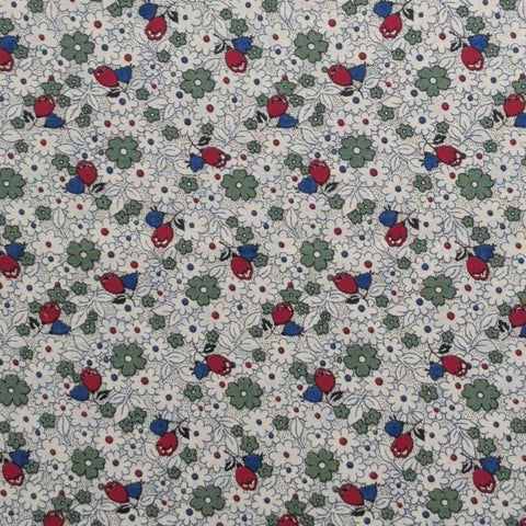 Judie Rothermel for Marcus Brothers Textiles - White Fabric / Red, Blue, Green Packed Flower Print