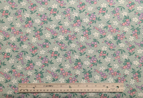 Aunt Grace by Judie Rothermel for Marcus Brothers Textiles -  White Fabric, Green Mesh Background / Lavender, White, Coral, Yellow Flower