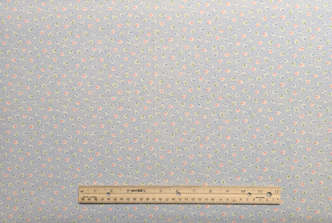 Marcus Bros Textiles - White Fabric with Blue Mesh Background / Pink, Green, Blue Leaf Print