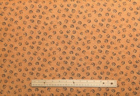 Moda by Lori Gardner - Orange and Black Speckle and Jack-O-Latern Face Fabric