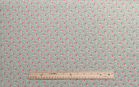 Aunt Grace Sweeties by Judie Rothermel for Marcus Brothers Textiles - White Fabric / Green, Pink, Red Packed Flower Print