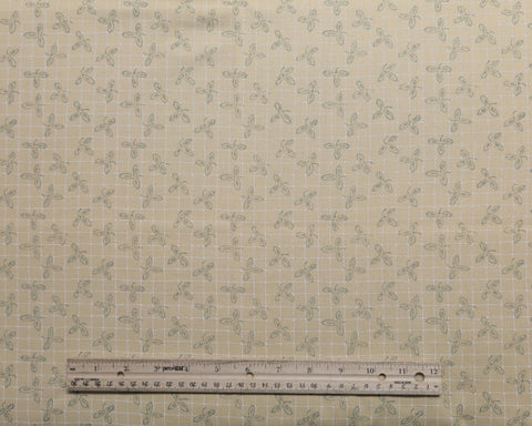 Story Book RJR Fashion Fabrics - Pale Yellow Fabric / White, Green, Navy Tossed Leaf Print