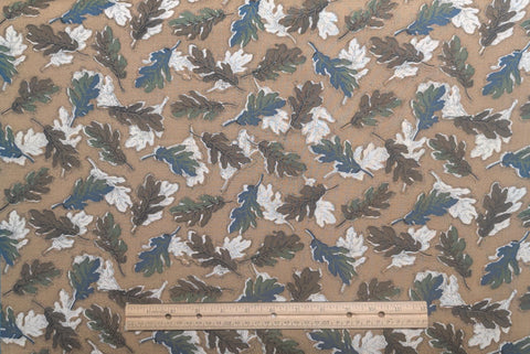 Marcus Bros Textiles - Tan Fabric, Brown Micro Dot / Brown, Green, White, Blue Tossed Oak Leaf Print