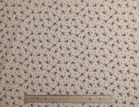 Marcus Brothers Textiles - Tan Fabric / Tossed Flag and Star Print